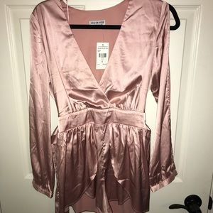 Fashion Nova silky blush pink color romper.